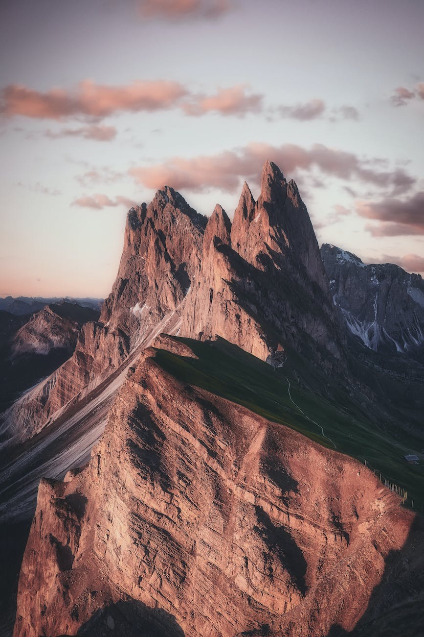 mountain range under beige sky